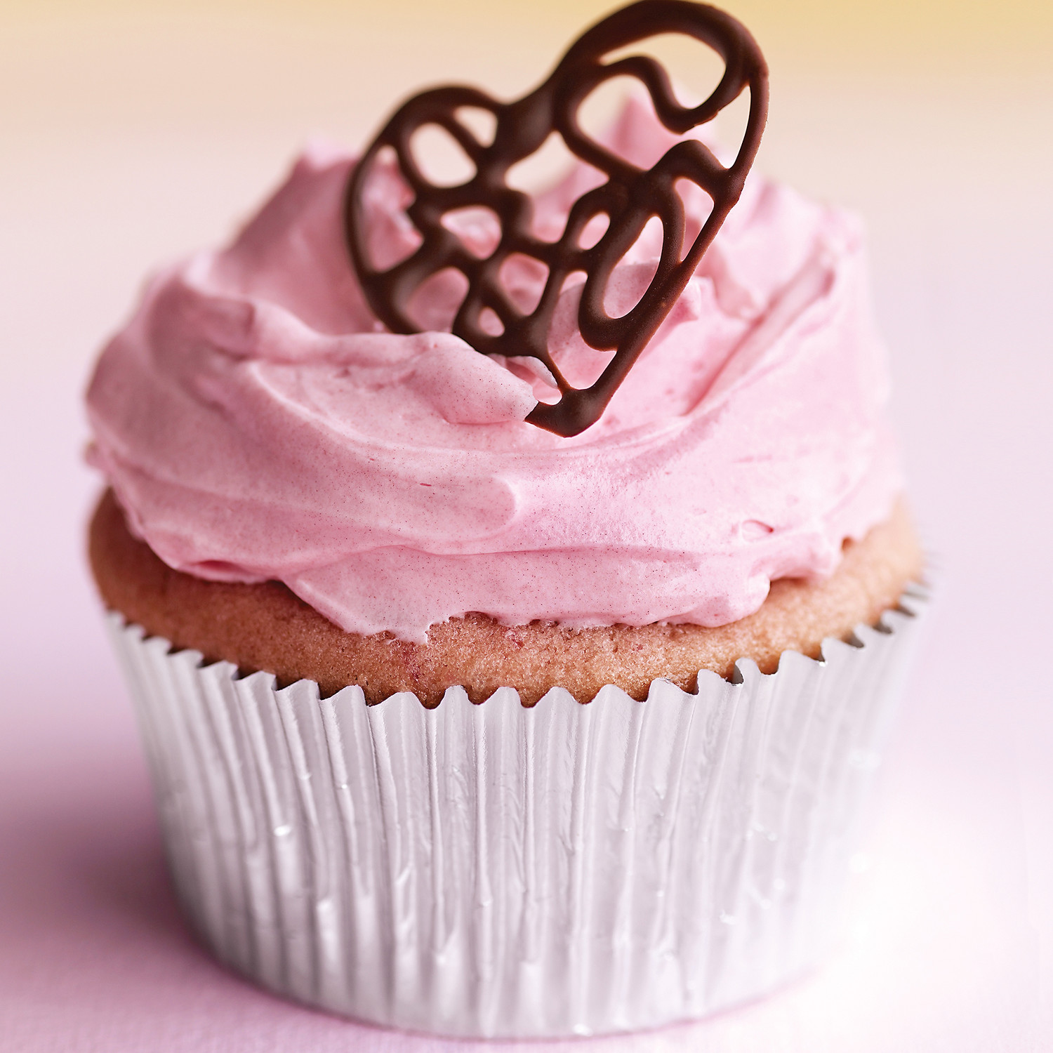 Raspberry Cupcakes with Pink Buttercream and Lacy Chocolate Hearts