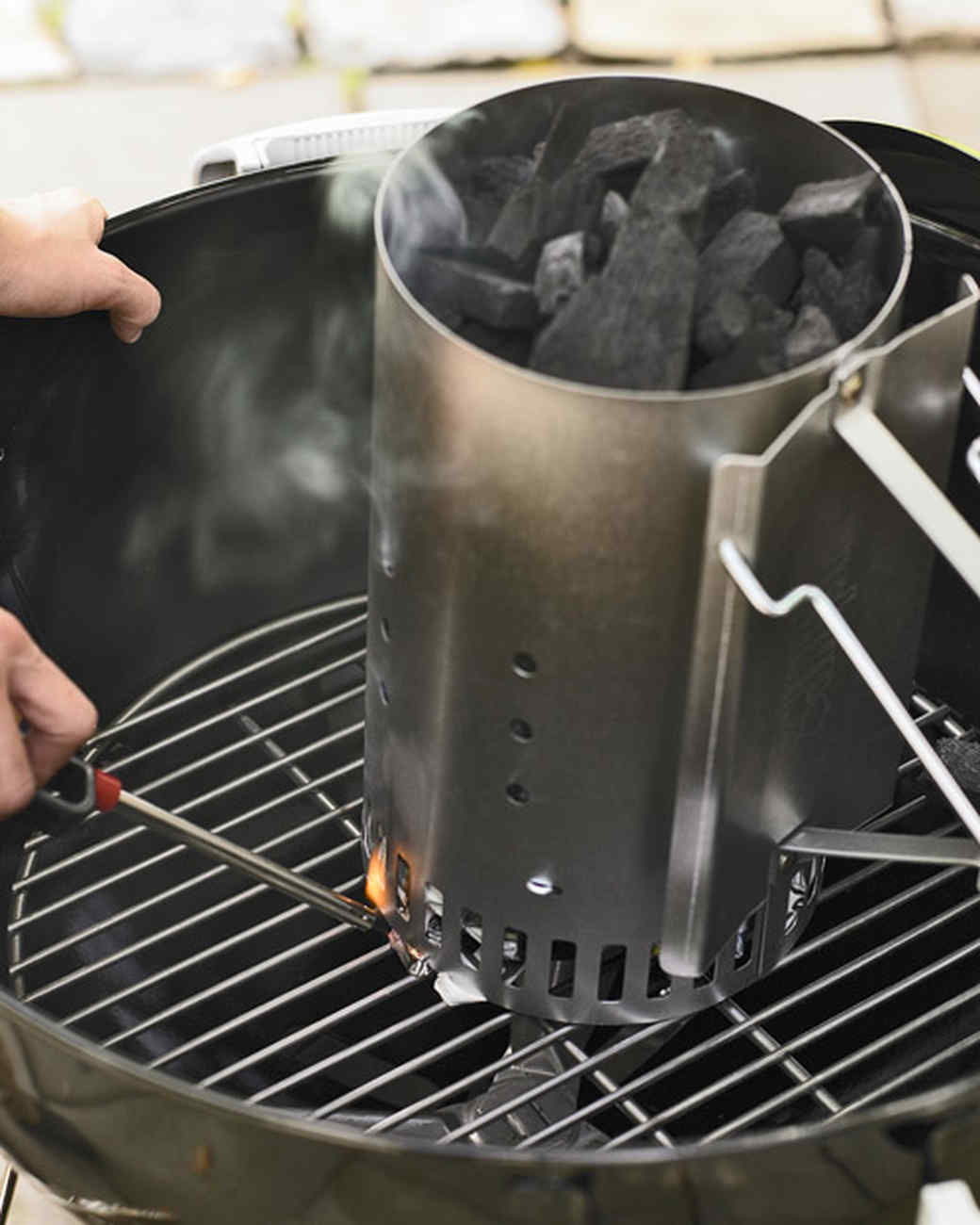 How do you start a charcoal grill?