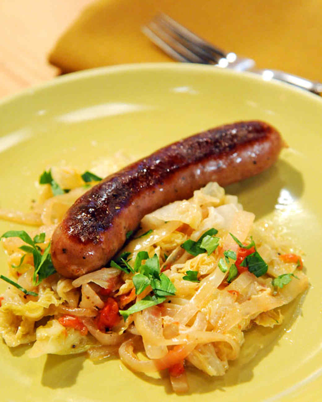 Beer-Braised Bratwurst with Cabbage Recipe & Video | Martha Stewart