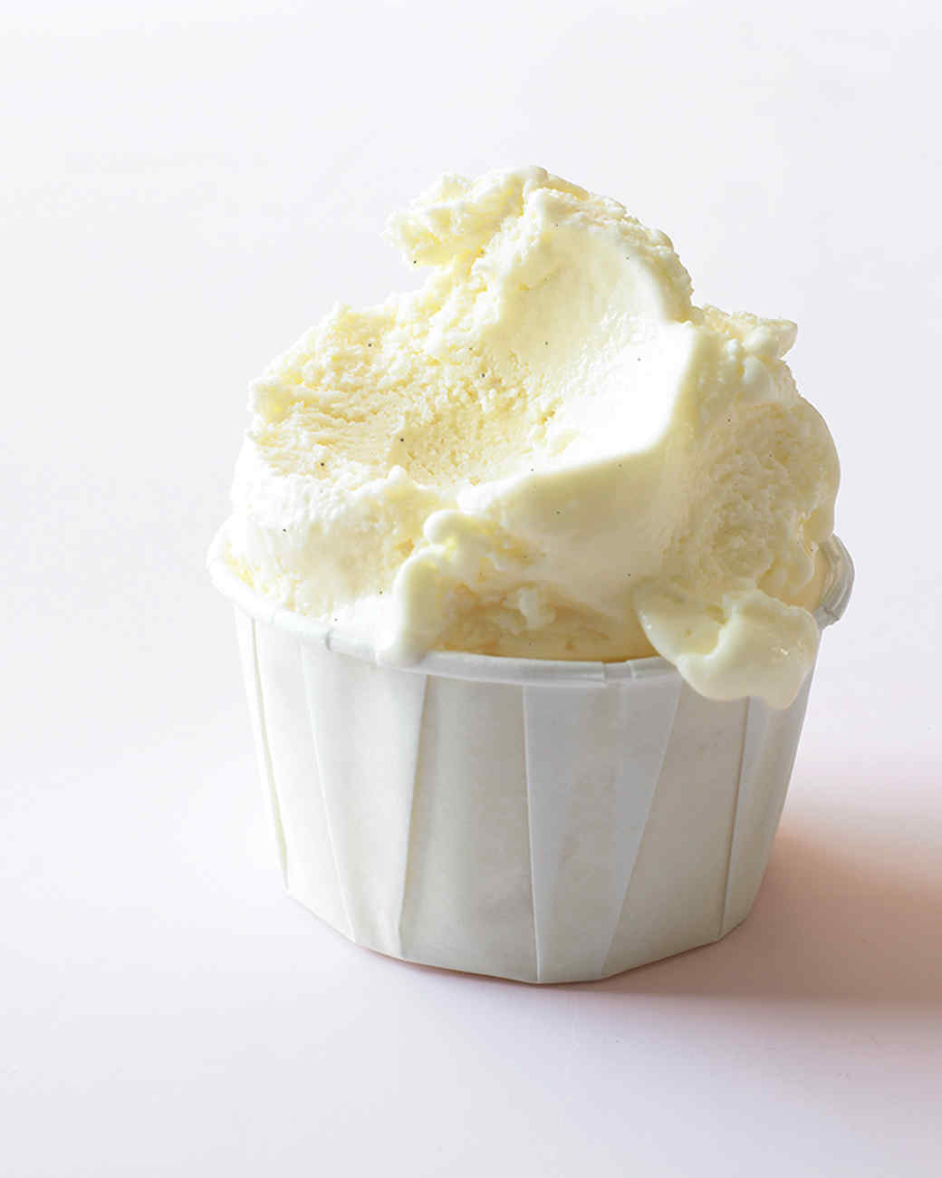 Photo of quick vanilla ice cream ingredients: heavy cream, whole milk, superfine sugar, pure vanilla extract, salt