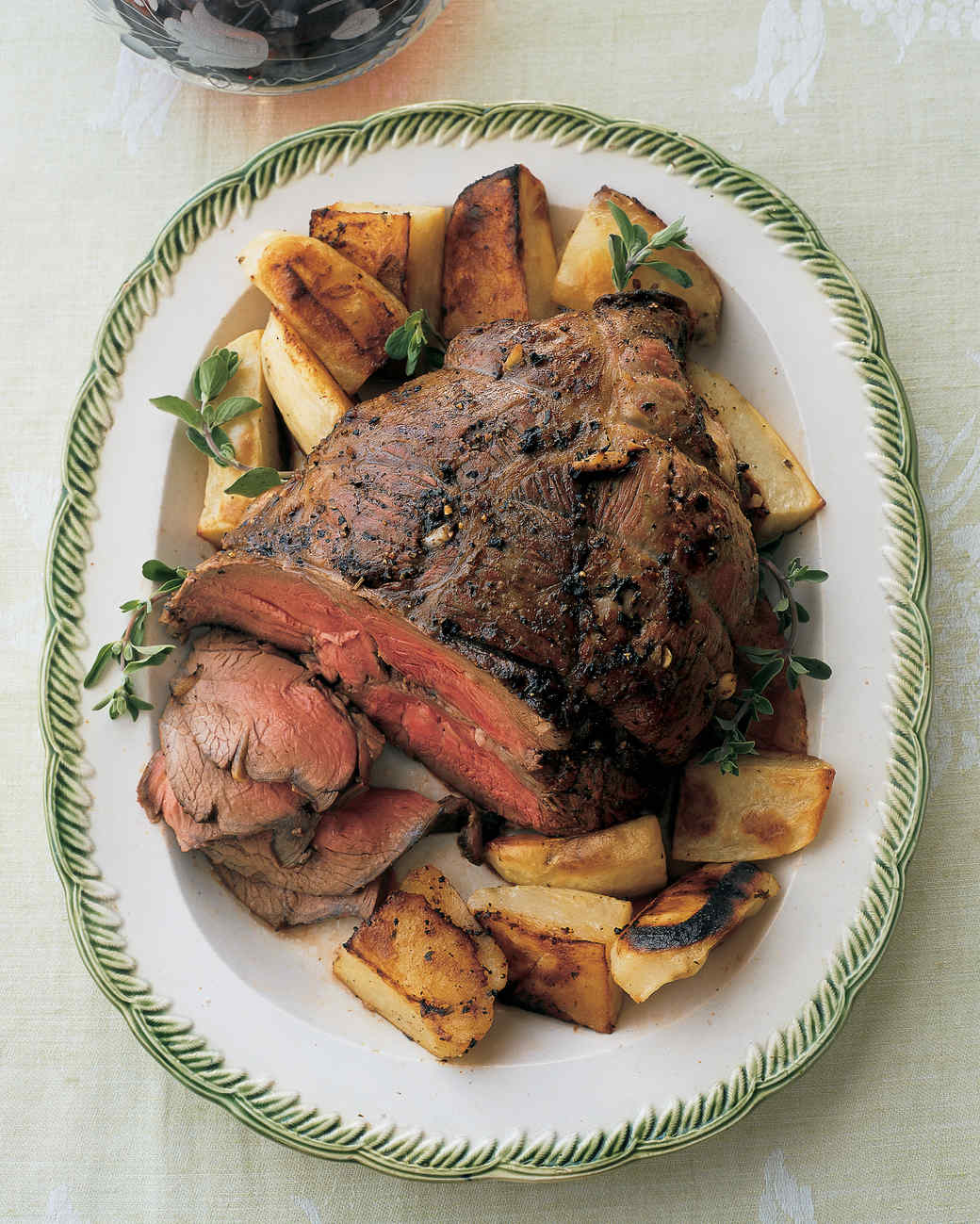 Roast Boneless Leg of Lamb with Potatoes, Lemon, and Marjoram