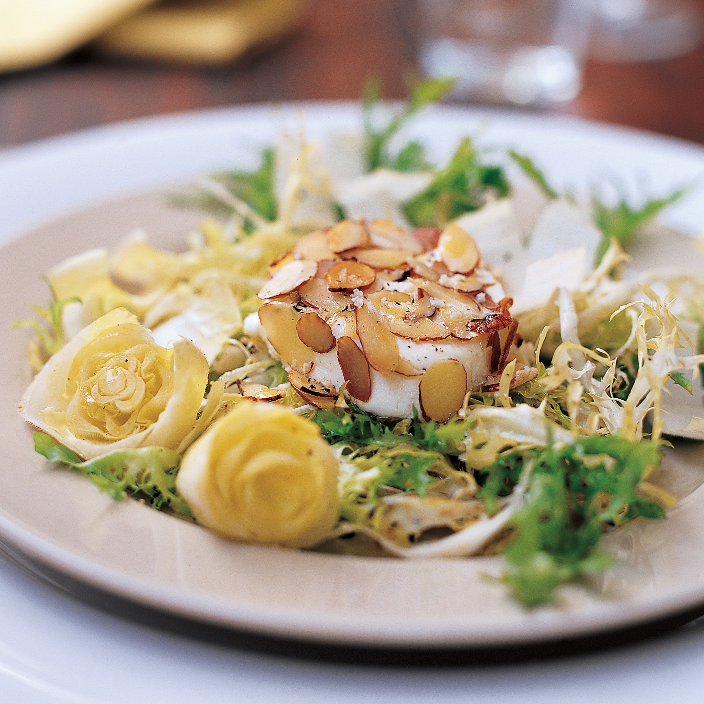 AlmondCoated Goat Cheese, Frisee, and Belgian Endive Salad
