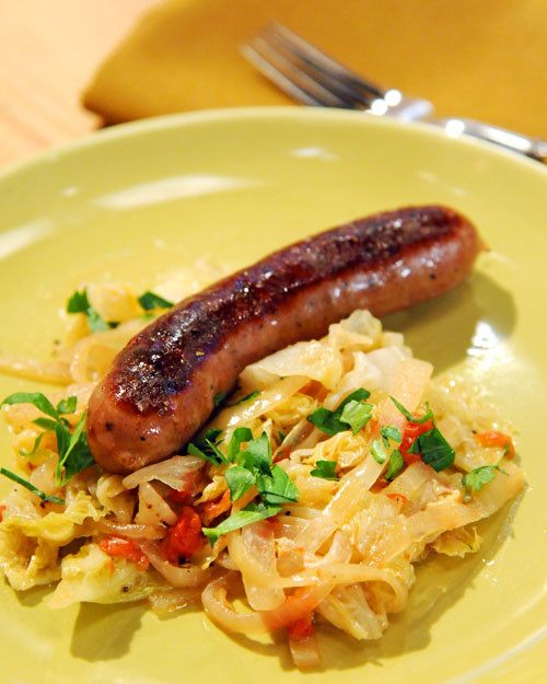 Beer-Braised Bratwurst With Cabbage Recipe & Video | Martha Stewart