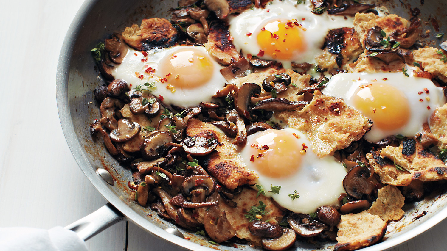 Sauteed Mushrooms with Toasted Flatbread and Baked Eggs