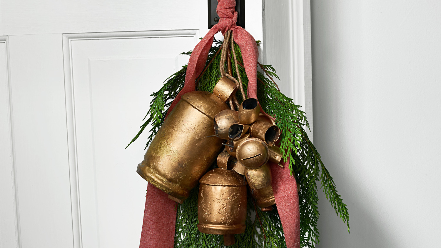 Cedar and Brass Bells Door Decoration | Martha Stewart
