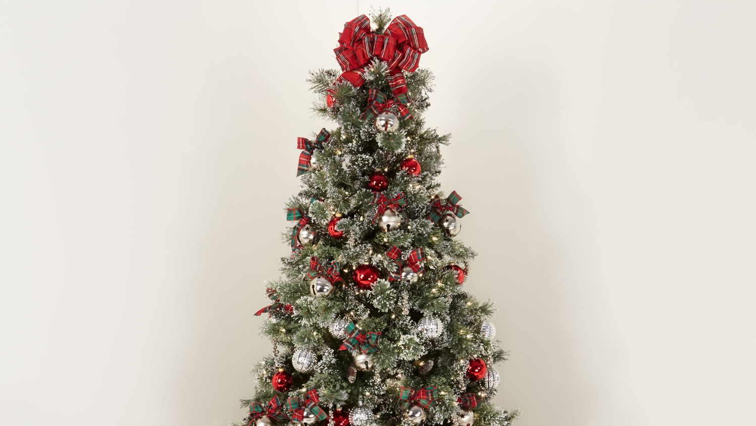 how to decorate a silver jingle bells christmas tree martha stewart - Christmas Tree Bell Decoration how to decorate a silver jingle bells christmas tree martha stewart - Christmas Tree Bell Decoration