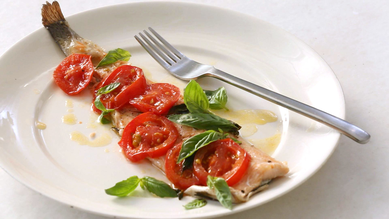 Video Tomatoes and Basil Trout Baked in Parchment Martha Stewart