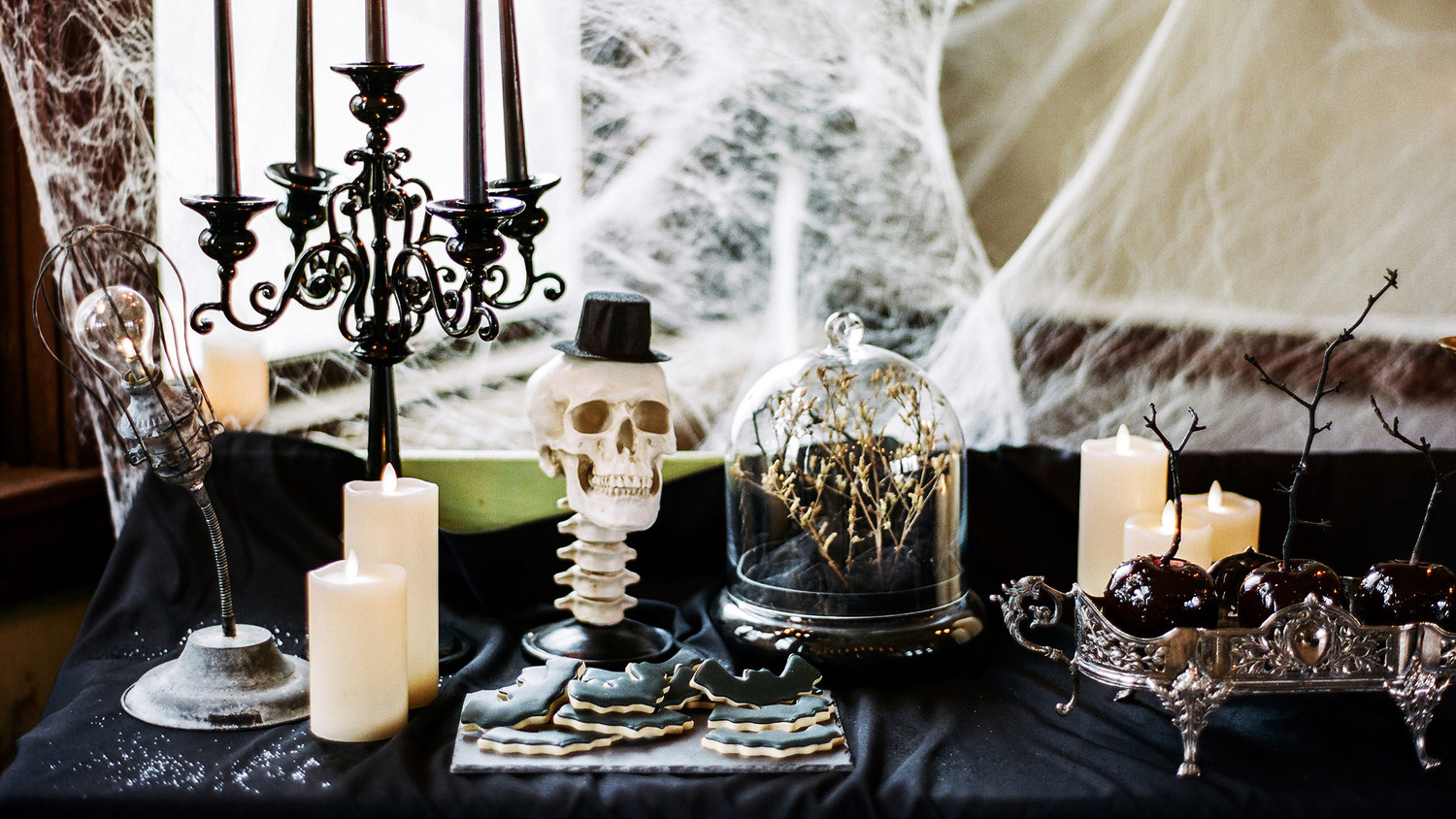 eli skeleton masquerade birthday party table decor cookies candles skulls