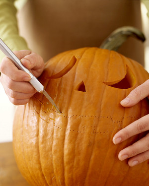 Image result for carving a pumpkin