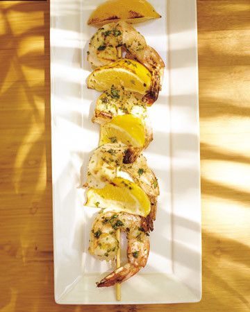 Shrimp Kebabs with Lemon Wedges and Cilantro_image