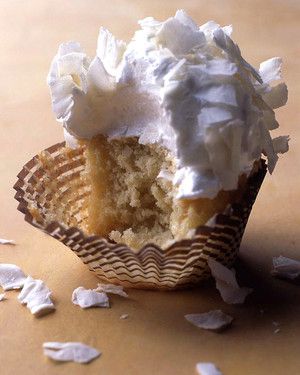 Coconut Cupcakes with Seven-Minute Frosting and Coconut Flakes image