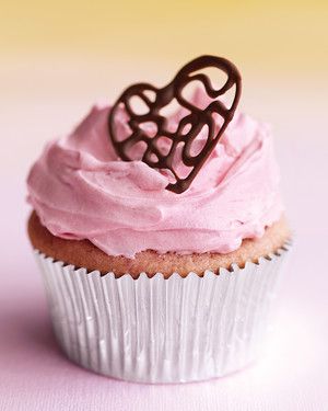 Raspberry Cupcakes with Pink Buttercream and Lacy Chocolate Hearts_image