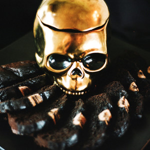 eli skeleton masquerade birthday party gold skull on tray with dark bread slices