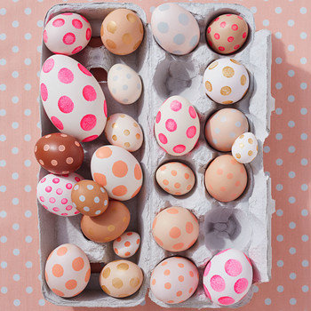 polka dotted easter eggs in carton