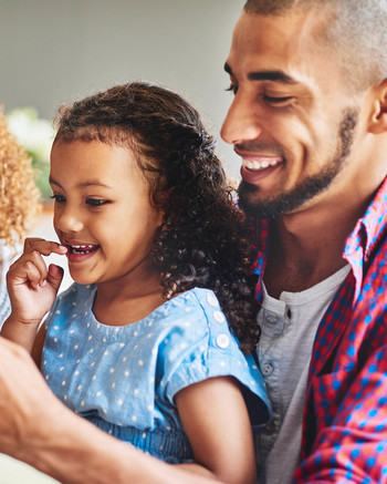 happy family looking at tablet