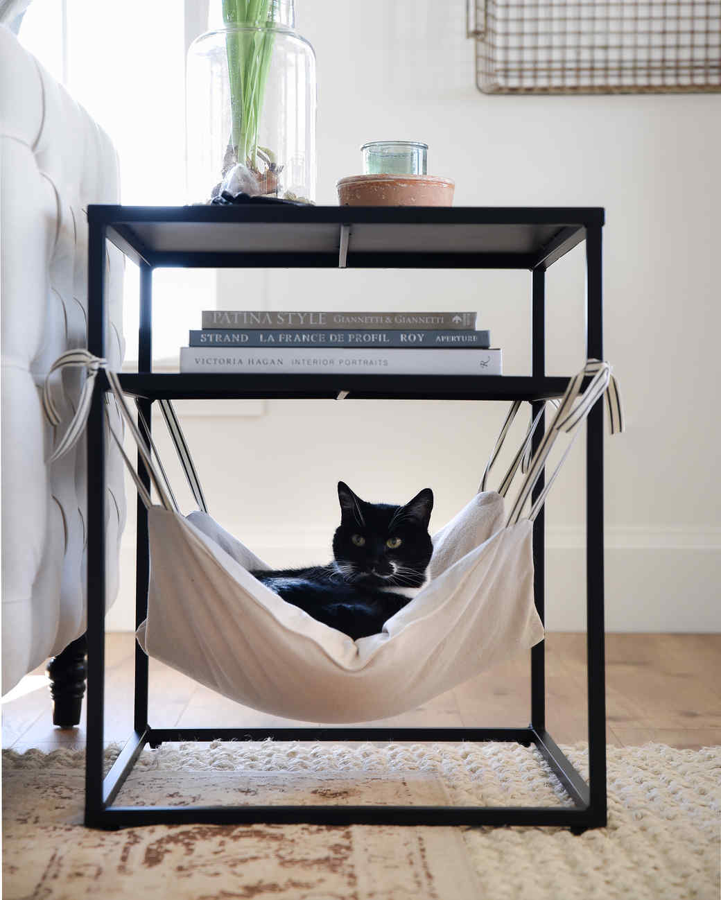 cat hammock under table
