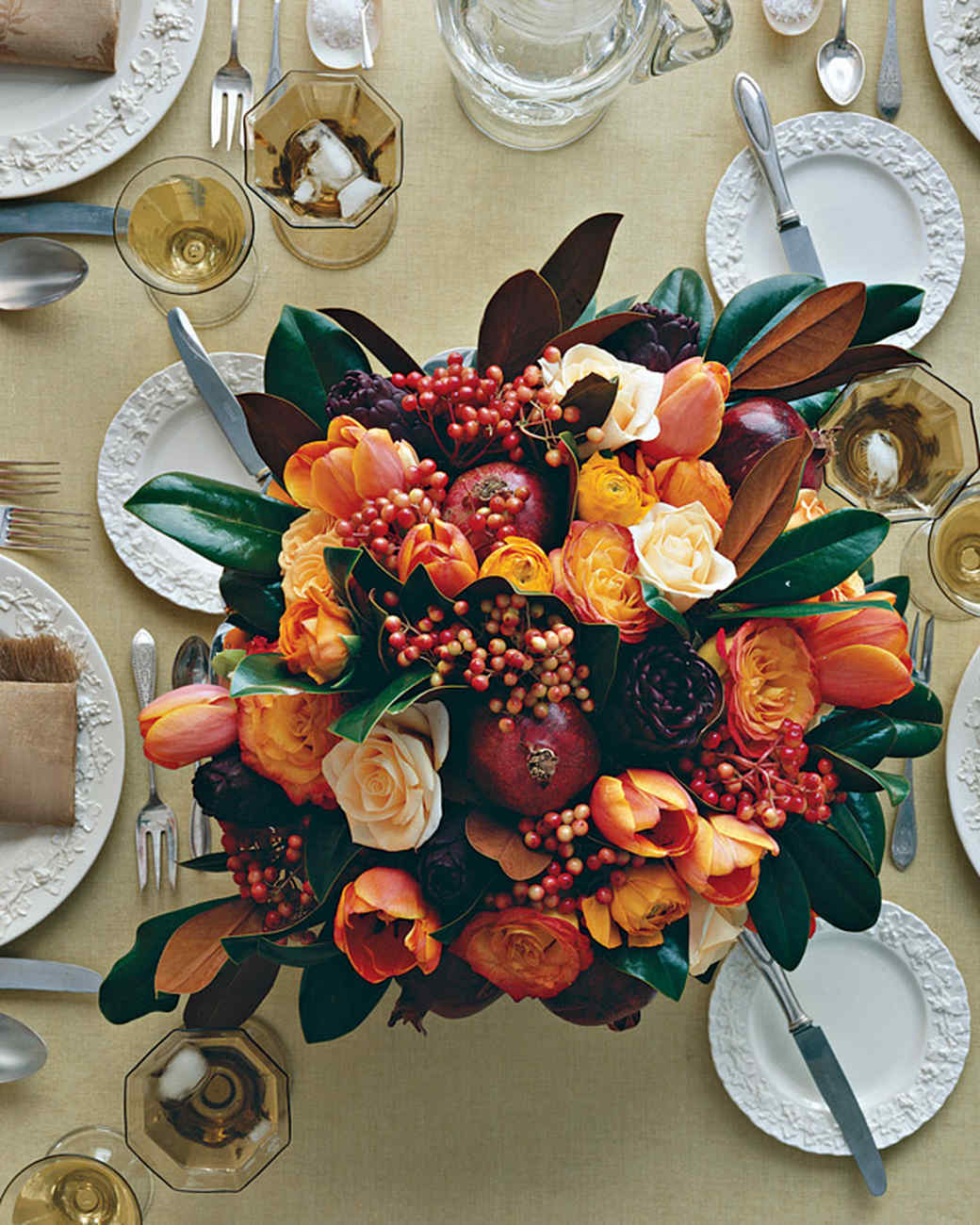 thanksgiving centerpiece with pomegranates tulips and roses