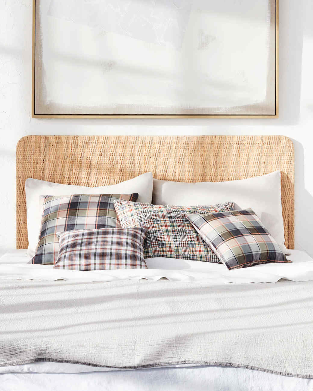 madras pillows on bed