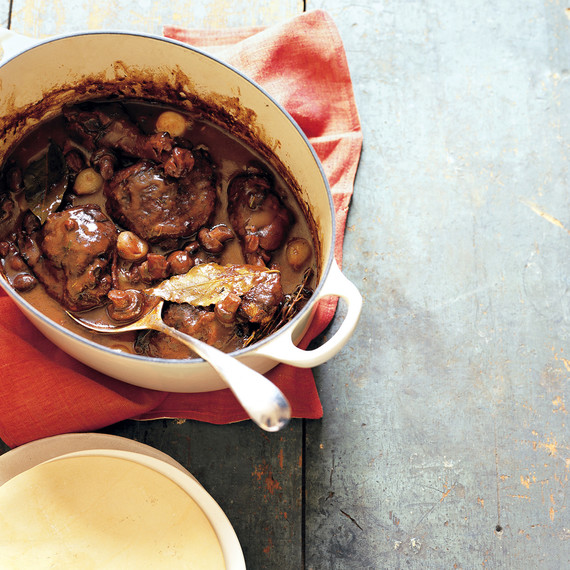 coq au vin with serving spoon coq au vin with serving spoon