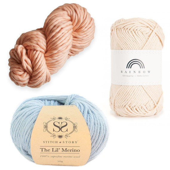 yarn collage with blue ball stitch story off white skein hobbii soft orange skein purlsoho yarn collage with blue ball stitch story off white skein hobbii soft orange skein purlsoho