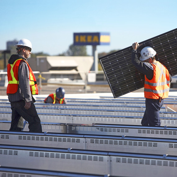 Ikea installing solar panels on rooftop Ikea installing solar panels on rooftop