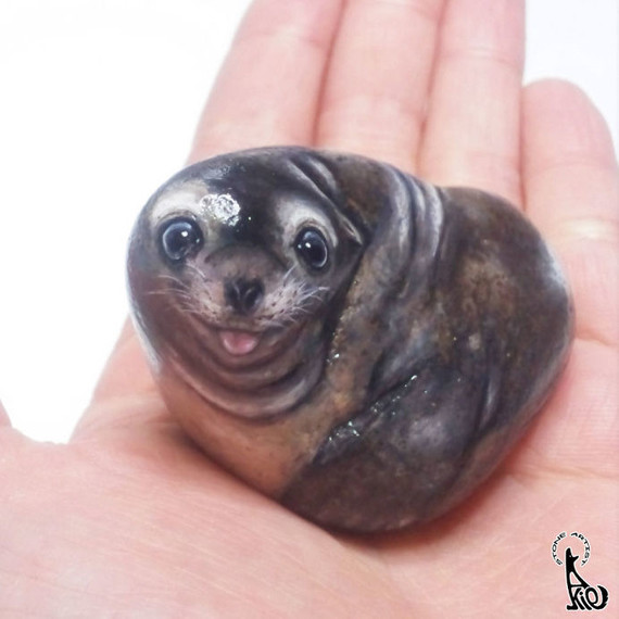 stone smiling sea lion stone smiling sea lion