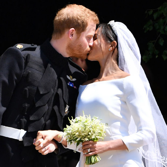 Meghan Markle and Prince Harry kiss on their wedding day. Meghan Markle and Prince Harry kiss on their wedding day.