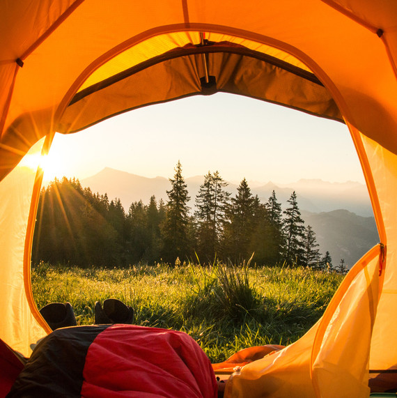 camping tent opening to forest outdoors camping tent opening to forest outdoors