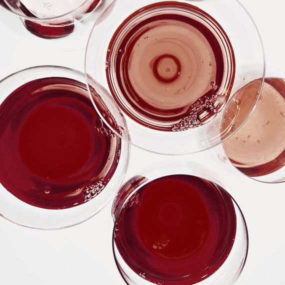 glasses of red orange wine glasses of red orange wine