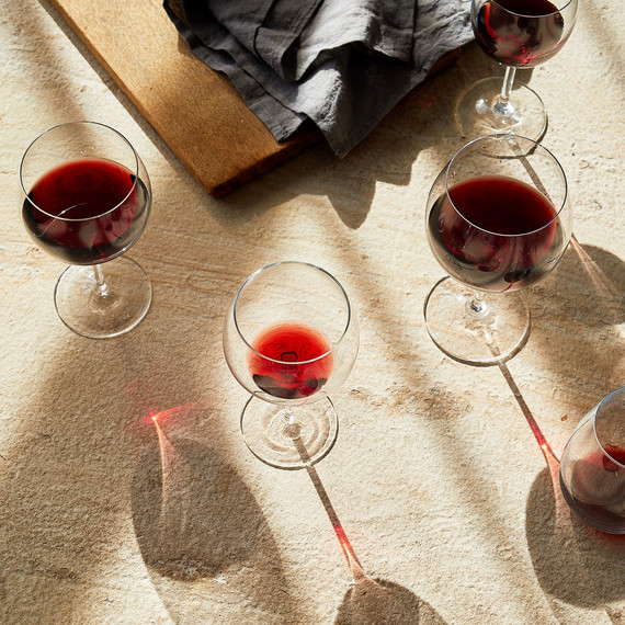 red wines in glasses on table red wines in glasses on table