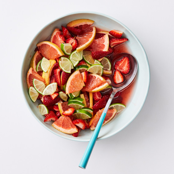 sangria in bowl with strawberries and limes sangria in bowl with strawberries and limes
