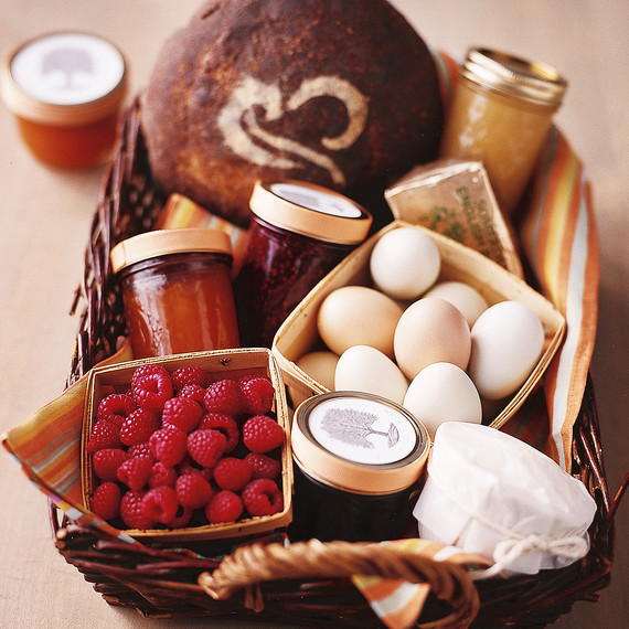 jams raspberries and eggs in a basket jams raspberries and eggs in a basket
