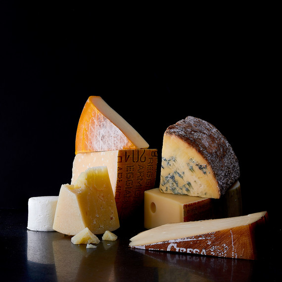 assortment of blocks of cheese assortment of blocks of cheese