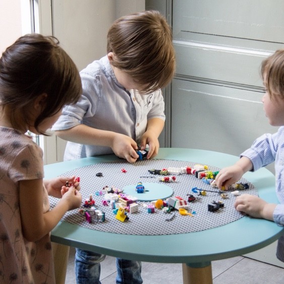 children playing with mutable kids play table children playing with mutable kids play table