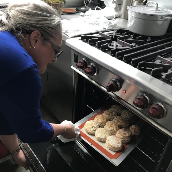 Virginia taking biscuits out of oven Virginia taking biscuits out of oven