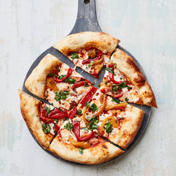 Pan-Bagnat Pizza individual slices on grey board Pan-Bagnat Pizza individual slices on grey board