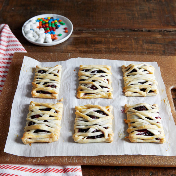 mummy hand pie pastries on cutting board with striped cloth mummy hand pie pastries on cutting board with striped cloth
