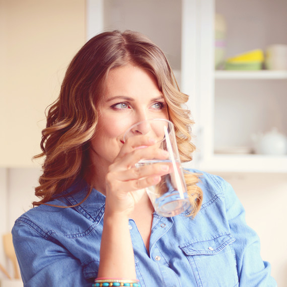 woman drinking tap water