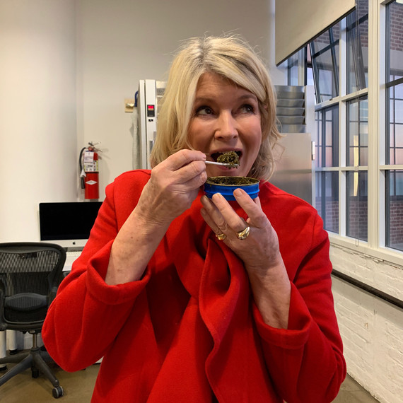 martha sampling caviar with white spoon martha sampling caviar with white spoon