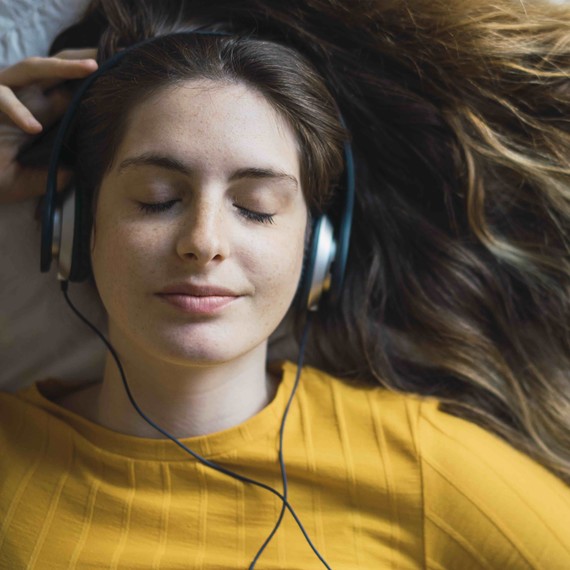 woman listening to music woman listening to music