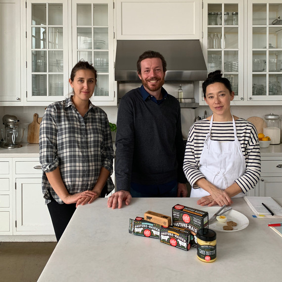 group standing in kitchen butter on counter group standing in kitchen butter on counter