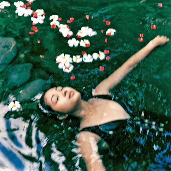 woman relaxing in water woman relaxing in water