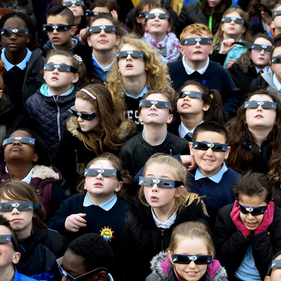 kids watching solar eclipse kids watching solar eclipse