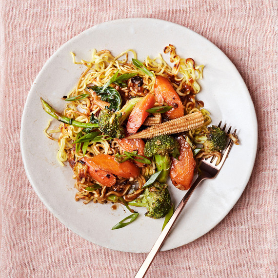 vegetarian chow mein on white plate with fork