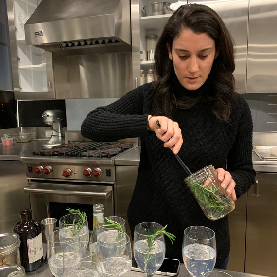 woman mixing and garnishing drinks woman mixing and garnishing drinks