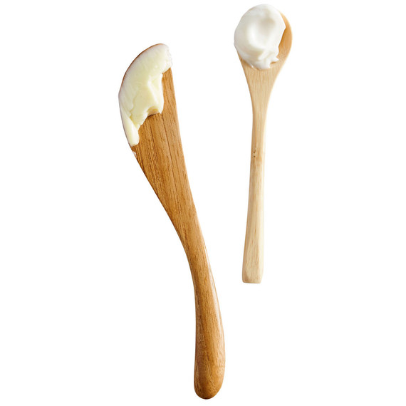 wooden spoons with butter wooden spoons with butter