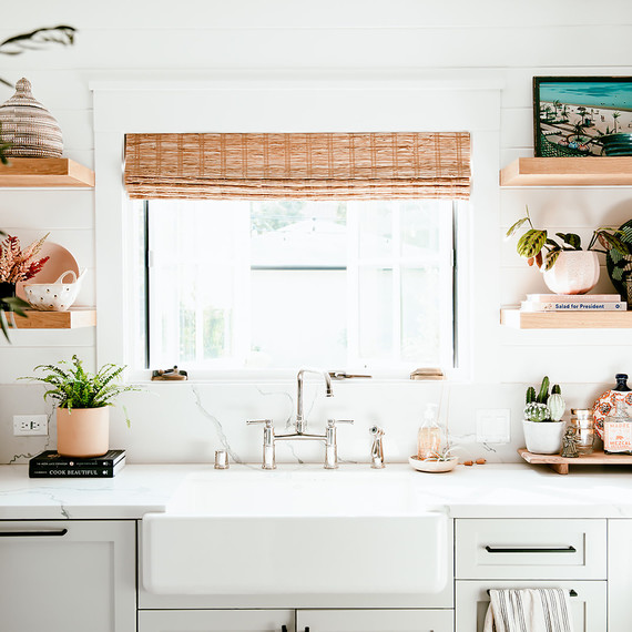 white kitchen with wood blinds and open shelving white kitchen with wood blinds and open shelving