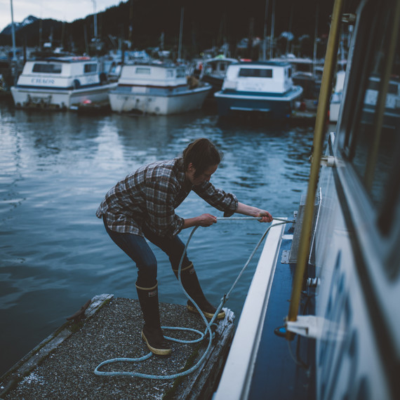 tying off boat in harbor nelly hand tying off boat in harbor