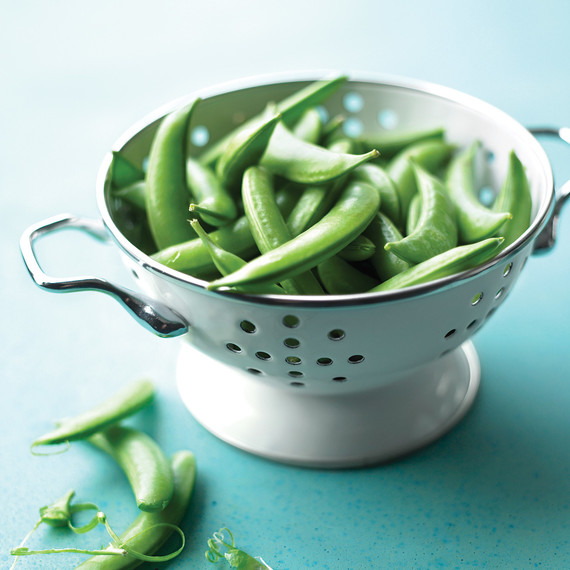 sugar snap peas in colander sugar snap peas in colander