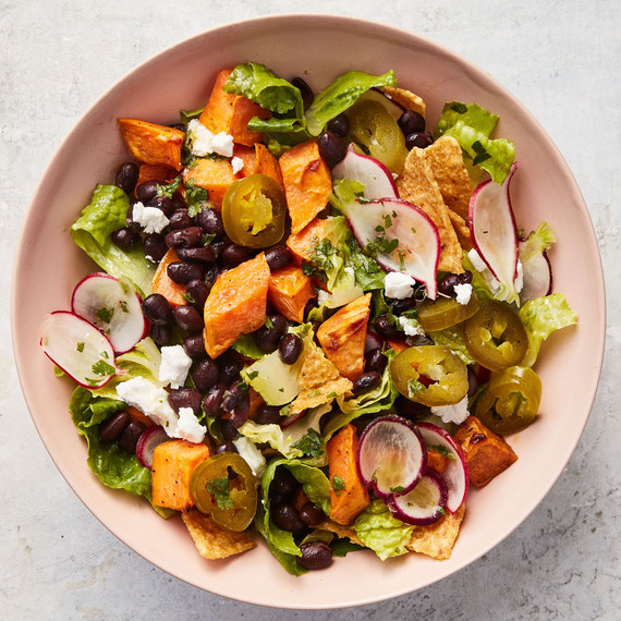 sweet potato taco salad served in pink bowl sweet potato taco salad served in pink bowl
